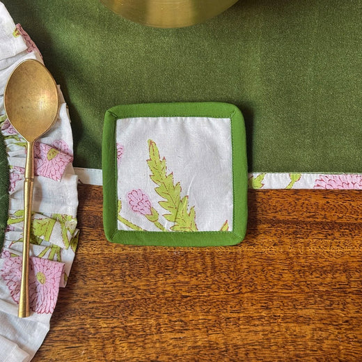 Moss green and white floral block print cotton coaster, top view