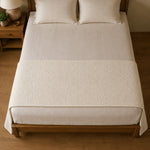 Thumbnail for Ivory Bouclé bed runner viewed from above across the foot of a bed