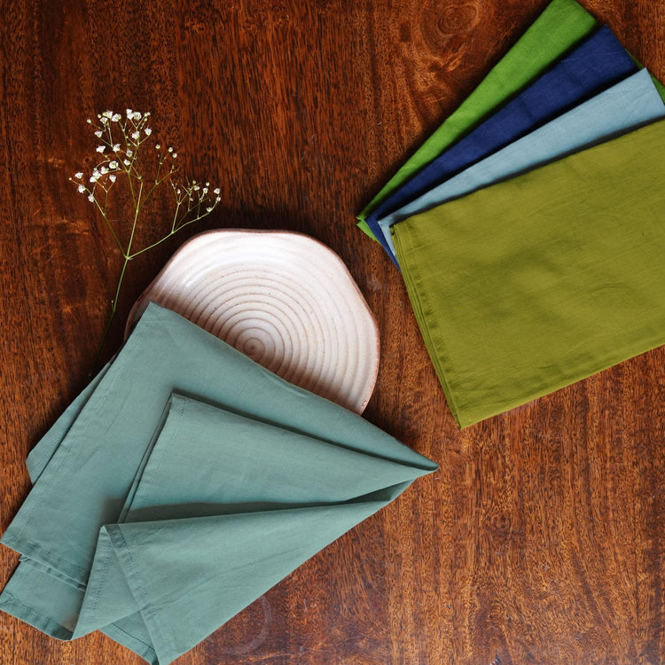 Blush solid cotton cambric cloth napkins with stitched hems