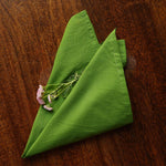 Thumbnail for Solid-dyed cotton cambric napkins folded for a dining table