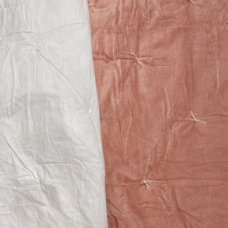 Handmade Cotton Velvet Quilt in Blush Pink, hand-knotted tassel detail