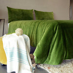 Thumbnail for Cotton velvet duvet cover draped over a bed corner