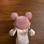 Thumbnail for Dusty rose velvet Mickey Mouse cushion with child for scale